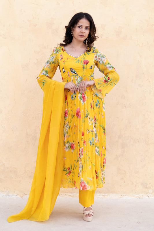 Yellow Anarkali suit with Organza dupatta.